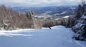 Family winter vacation skiing mountain